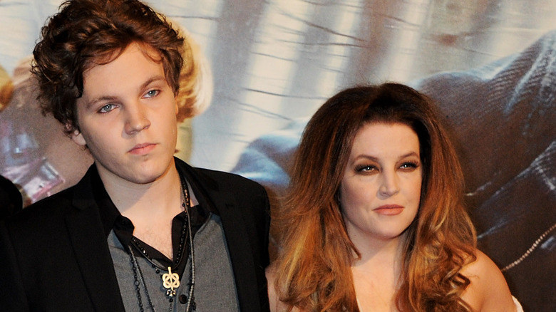  Lisa Marie Presley posing with Benjamin Keough