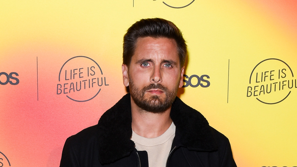 Scoot Disick poses at an event