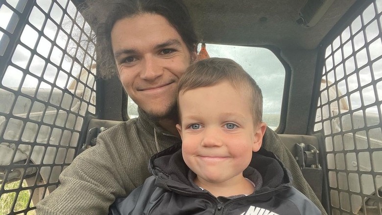 Jacob Roloff and Jackson Roloff in excavator