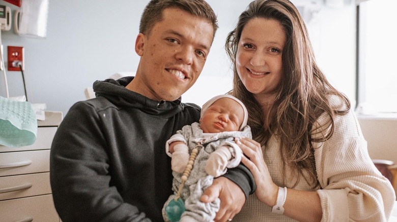 Zach and Tori Roloff holding baby Josiah