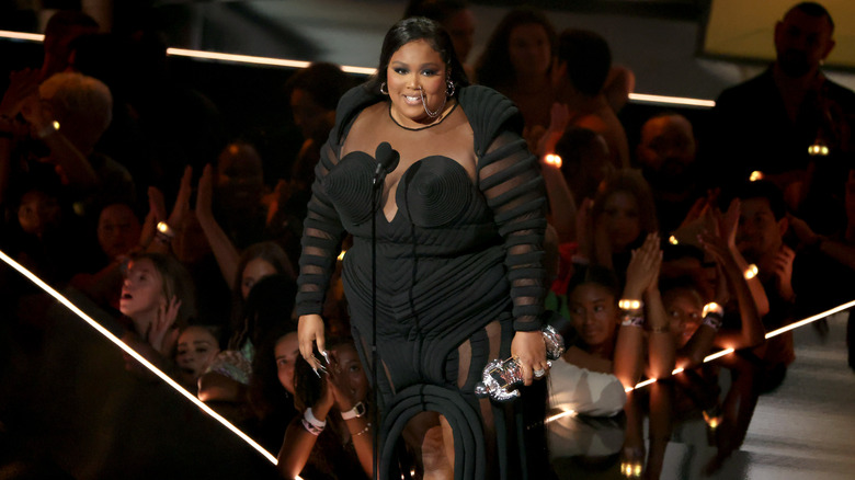 Lizzo accepting her VMA for Best Video For Good