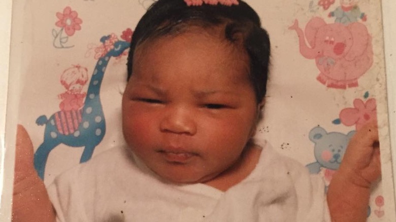 Baby Lizzo in pink hair bow