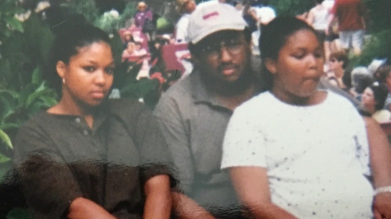 Teen Lizzo posing with father and mother