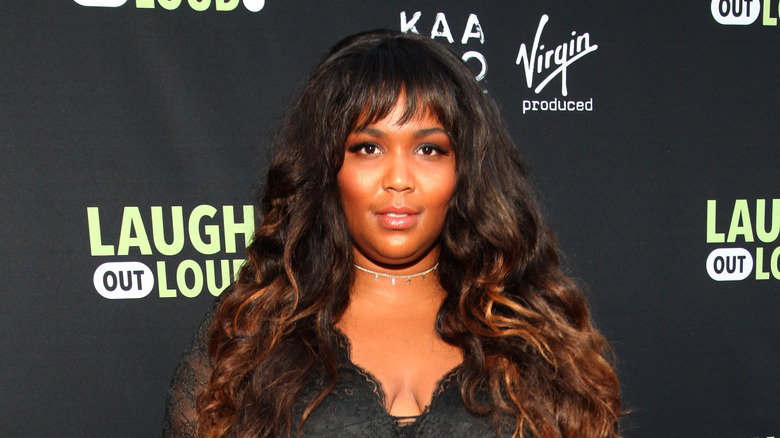 Lizzo with bangs, posing