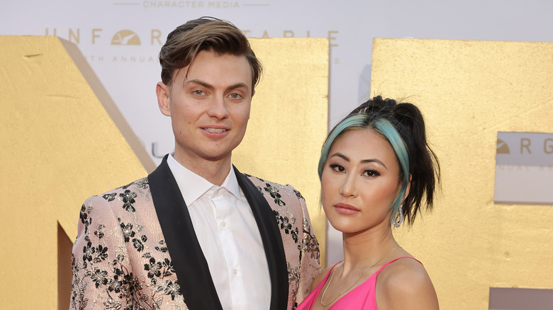 Carter Sharer and Lizzy Capri pose on the red carpet