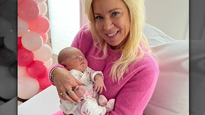 Theresa Caputo holding baby Michelina