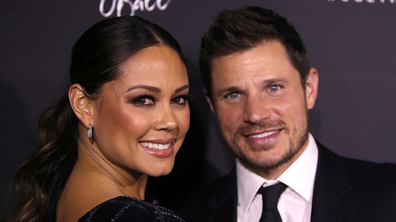 Nick and Vanessa Lachey posing