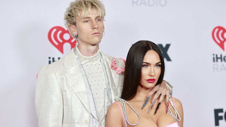 Machine gun kelly hand around megan fox