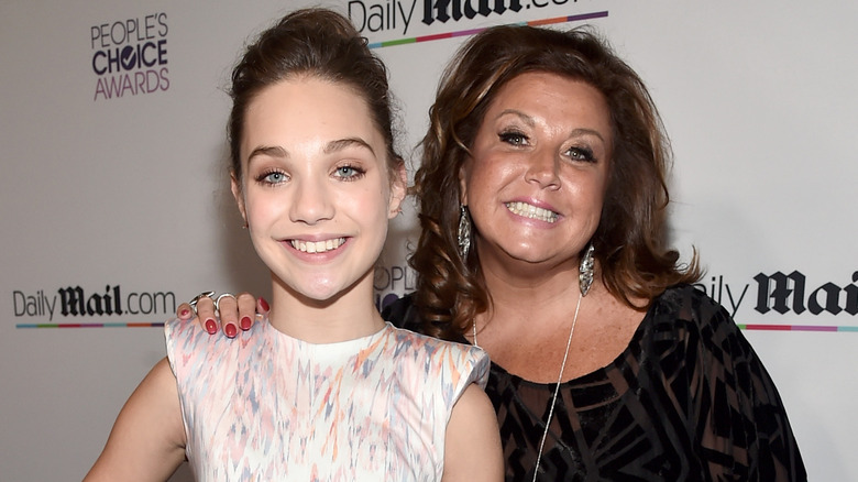 Maddie Ziegler and Abby Lee Miller smiling