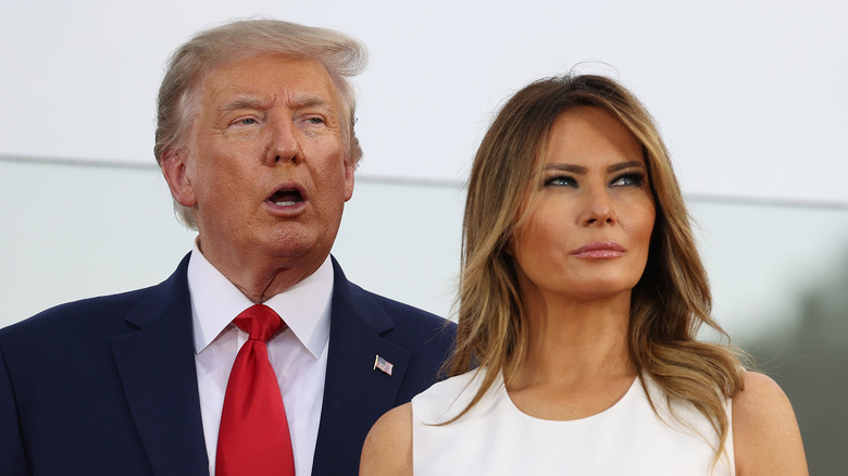 Donald and Melania Trump looking up