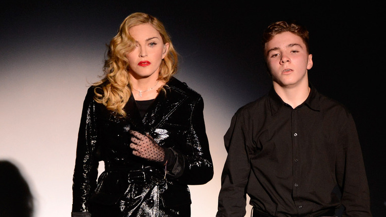 Madonna and Rocco wearing black