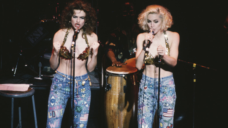 Madonna and Sandra Bernhard perform on stage