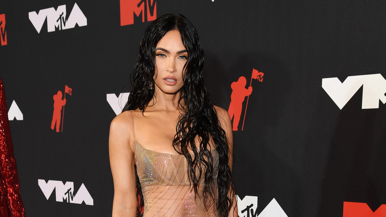 Megan Fox posing on red carpet at 2021 VMAs