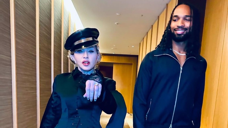 madonna holds out her ring with boyfriend Akeem Morris