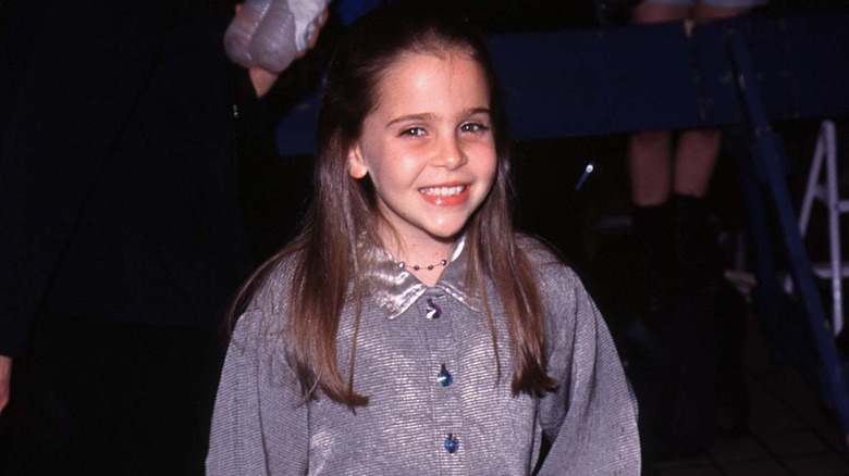 Mae Whitman smiling as a kid