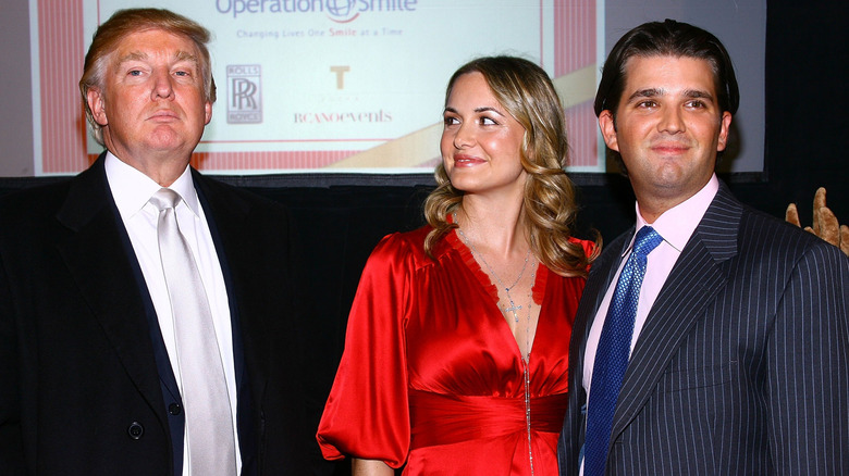 Vanessa Trump standing beside Donald Trump Jr. and looking at Donald Trump