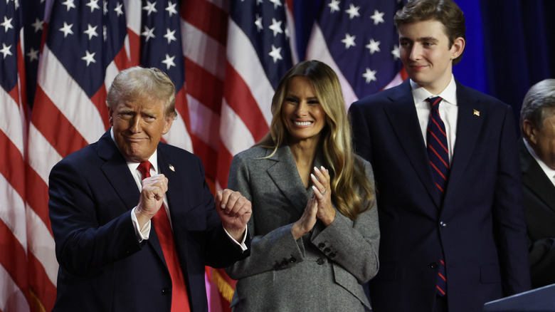 Donald Trump dancing beside Melania and Barron Trump at election night event