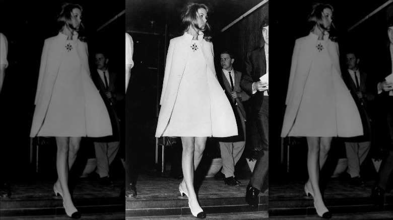 Jean Shrimpton wearing a white dress 