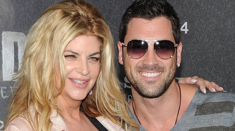 Maks Chmerkovskiy, Kirstie Alley, posing together