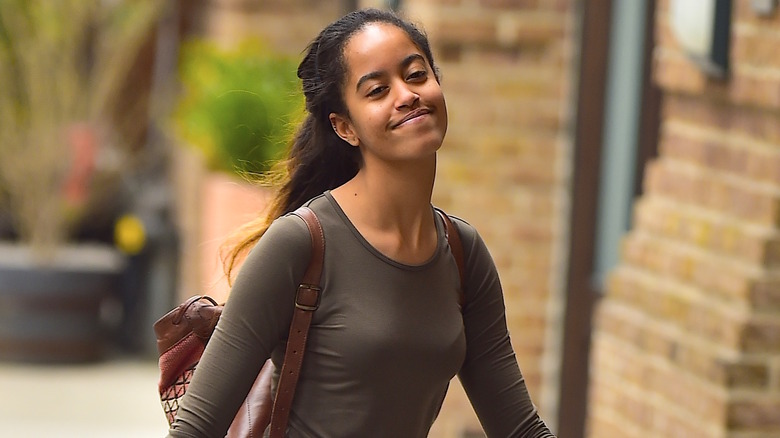 Malia Obama wearing backpack