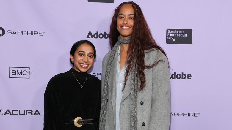 Malia Obama smiling with friend