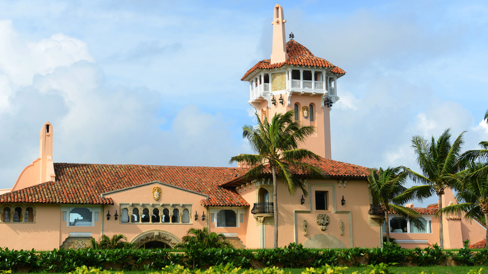 Mar-a-lago against a backdrop of clouds and blue sky