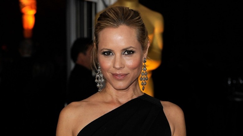 Maria Bello closed mouth smile