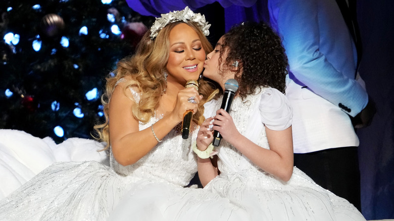 Mariah Carey and daughter Monroe kissing