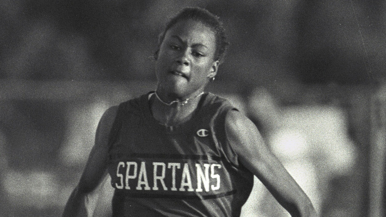 Teenage Marion Jones during a race