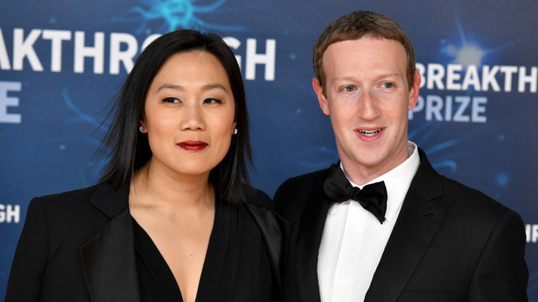 Priscilla Chan and Mark Zuckerberg wearing black tie