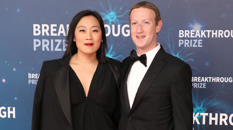 Mark Zuckerberg and his wife on the red carpet