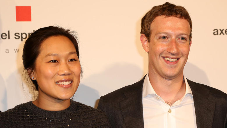 Mark Zuckerberg and Priscilla Chan smiling