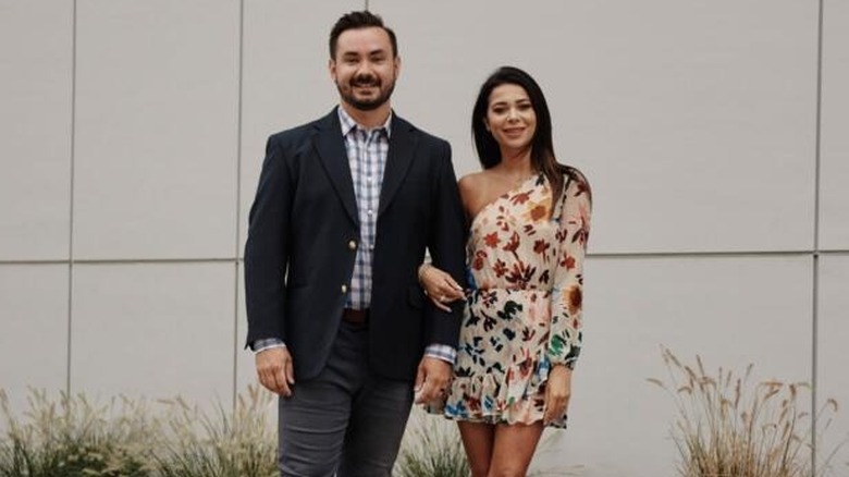 chris and alyssa married at first sight posing awkwardly together