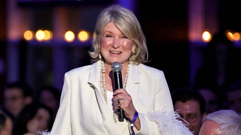 Martha Stewart holding microphone