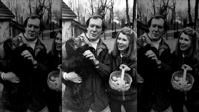 Martha Stewart poses with her then-husband Andrew and a chicken