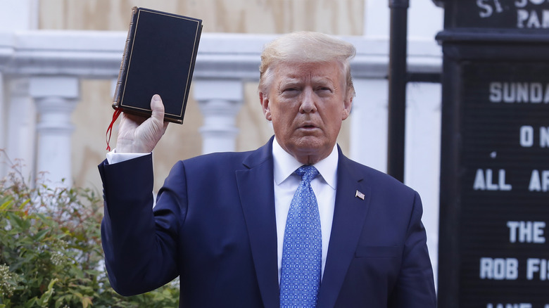 Donald Trump holding Bible