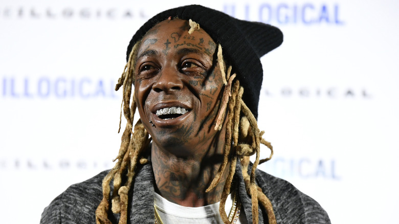 Lil Wayne, looking happy