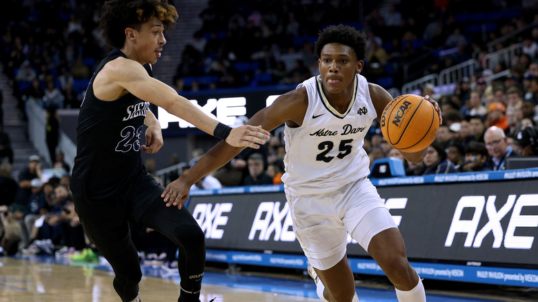 Mercy Miller playing basketball