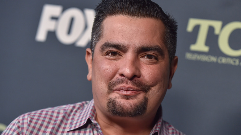 Aaron Sanchez smiles at an event