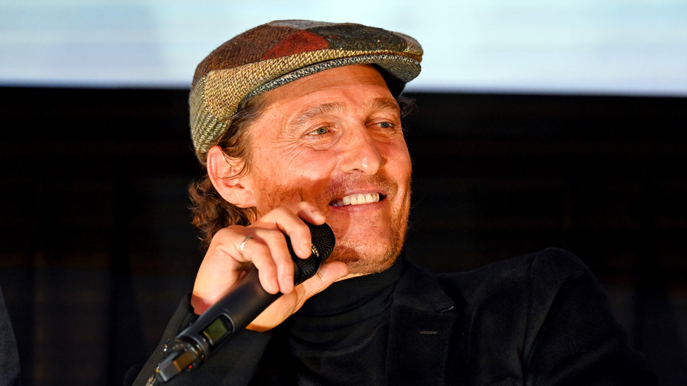 Matthew McConaughey smiling at an event