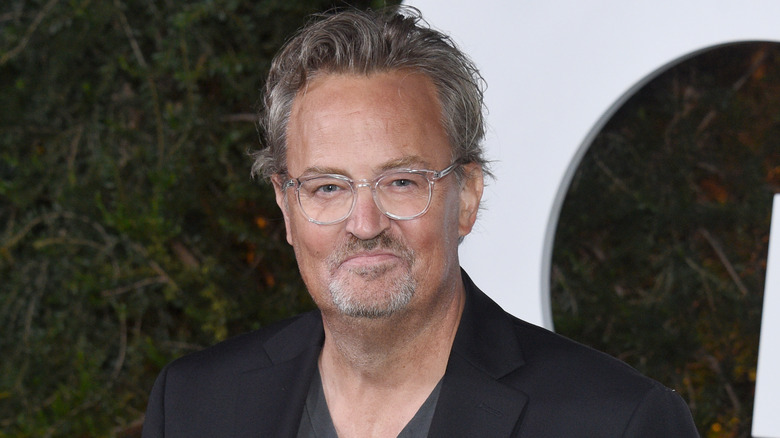 Matthew Perry wearing glasses