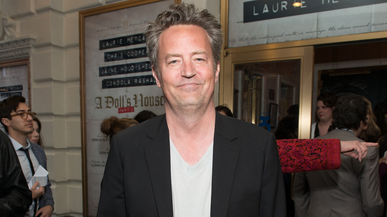 Matthew Perry in blazer and t-shirt at an event
