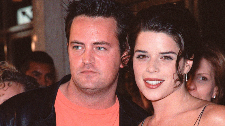 Matthew Perry and Neve Campbell pose