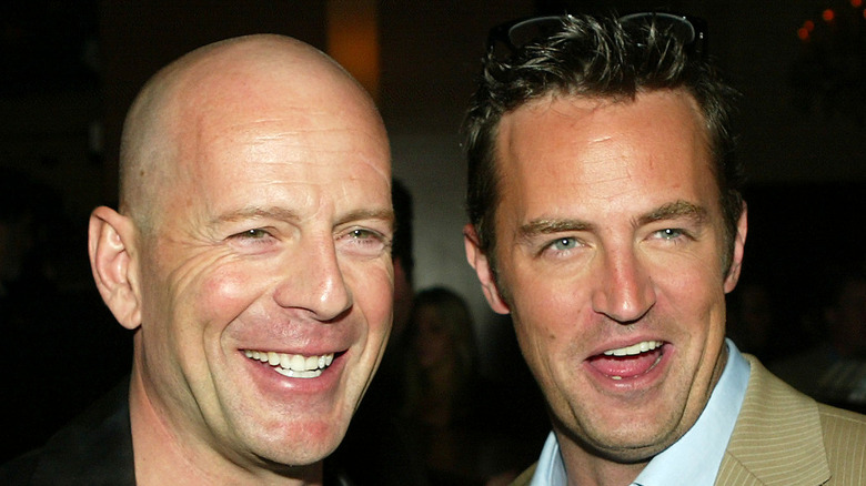 Bruce Willis and Matthew Perry with big smiles