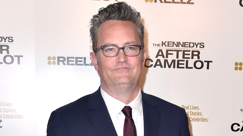 Matthew Perry wearing glasses