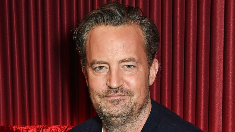 Matthew Perry posing for photo