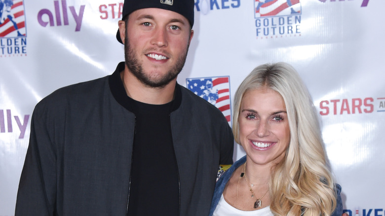 Matthew Stafford and Kelly Stafford at an event