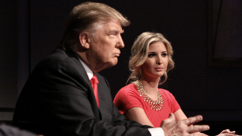 Donald and Ivanka Trump sit together