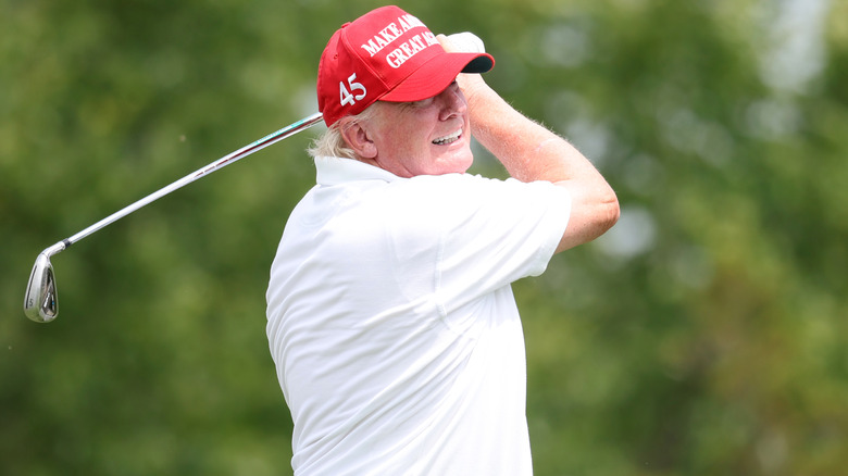 Donald Trump playing golf