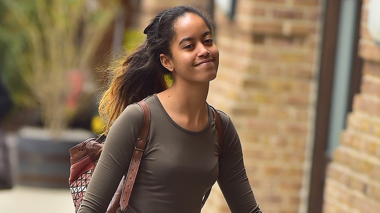 Malia Obama walking outside